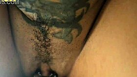 she lubes up lies sideways takes full inside till it spills