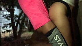 A man spreads his girlfriend's legs in the alley