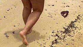 i love watching my sexy asian wife's big tits bounce nude on beach
