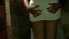 A man spreads his girlfriend's legs in the alley