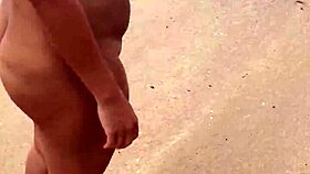 i love watching my sexy asian wife's big tits bounce nude on beach