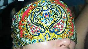 Tied up girlfriend sucks big cock while watching kinky videos