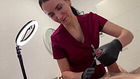 nurse shoves laser on balls while deepthroating throbbing cock