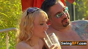 bisexual swingers share passionate kisses and sensual group encounters