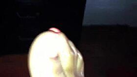 Ebony amateur delivers intense footjob with perfect toes