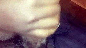Ebony babe gives nasty bbc handjob while watching movie