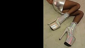 Silver black fishnet pantyhose shines with high heel ankle boots