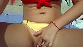 blonde teases pussy publicly on beach in solo outdoor play