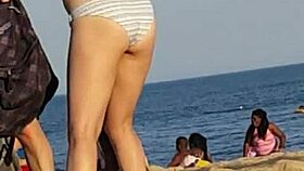 look at this skinny beach bitch caught candid with her ass out again