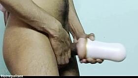 He grips the fleshlight tight, pounding it relentlessly in extreme jerking frenzy.