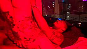 hot tattooed girl with big natural tits gets roughly fucked by muscular guy in the redroom interracial style