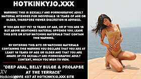 deep anal toys bulge her belly into prolapse on the rooftop terrace