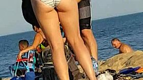 look at this skinny beach bitch caught candid with her ass out again