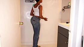 ebony model soaks jeans peeing messy in steamy shower fetish