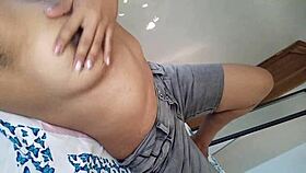 Latina woman reveals chest massages areolas jeans dampen