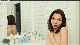 i'm in the warm shower fingering my shaved pussy so good... oh wait, it's getting too slippery now