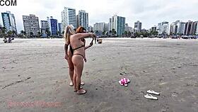 slutty babe flashes her pussy and ass on the beach with hot friend