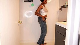 ebony model soaks jeans peeing messy in steamy shower fetish