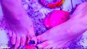 Wanna see my bare toes crush this juicy wet fruit slowly?