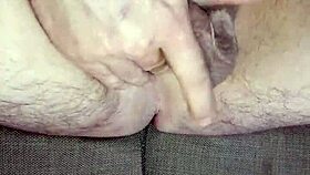 He strokes uncircumcised cock in bedroom solitude