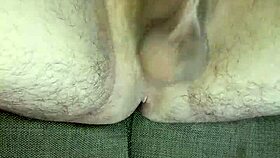 He strokes uncircumcised cock in bedroom solitude