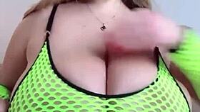 Curvy woman with natural breasts gently fondles herself