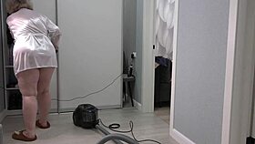 Thick chubby milf's big boobs bounce under short robe on home cam