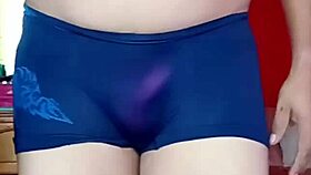 femboy sways seductively in sheer panties and lingerie