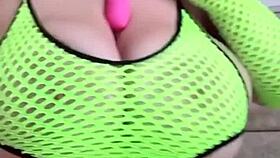 Curvy woman with natural breasts gently fondles herself