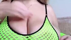 Curvy woman with natural breasts gently fondles herself