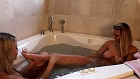 cute blonde tabby licks lesbian dildo deep in steamy bathtub orgasm