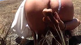 a sexy milf like marilyn monroe masturbates outdoors with dildo