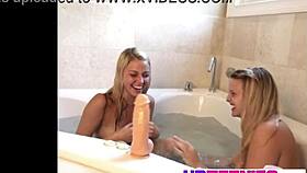 cute blonde tabby licks lesbian dildo deep in steamy bathtub orgasm