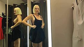 Blonde flashes massive tits in see-through mall try-on public thrill