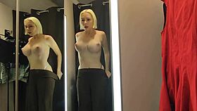 Blonde flashes massive tits in see-through mall try-on public thrill