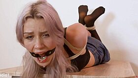 hogtied submissive teen punished with feet licking and toe sucking for bdsm humiliation