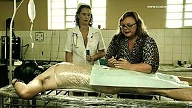 a dominatrix runs a harsh clinic for cock treatment.