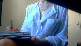 the hot secretary slips off her bra then fingers her bare pussy under miniskirt