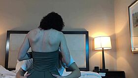 She shares a passionate kiss with the petite tattooed young woman nearby