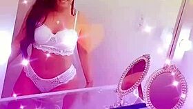 queen bee brunette with tanned skin and beautiful soft hair records steamy lingerie videos in private