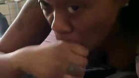 Ebony slut slurps big black cock sloppy deep and messy.