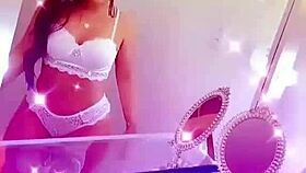 queen bee brunette with tanned skin and beautiful soft hair records steamy lingerie videos in private