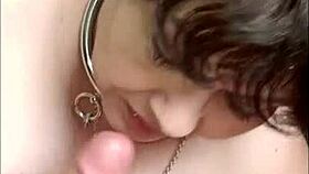 Marie the slave performs oral service on three men in bdsm session
