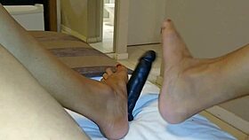 Big-ass brunette dives into erotic toy handjob massage bliss