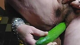 granny rams cucumber deep into hairy pussy