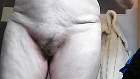 granny rams cucumber deep into hairy pussy