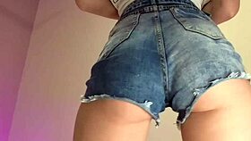 her tight denim shorts reveal too much skin