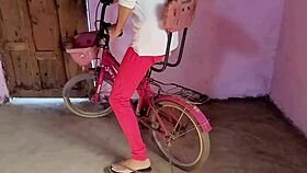 village girl rides bike caught by friends