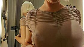 sexy crossdresser flashes huge tits in see-through haul at crowded mall changing room