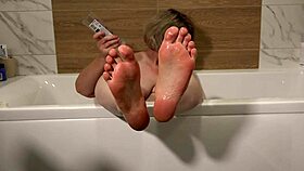 mature milf lounges in bath teasing foot fetish washing invitation